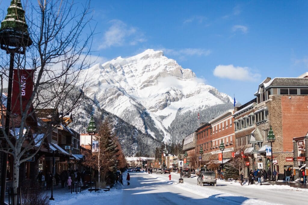 Banff in the winter with mountains - things to do in banff featured image