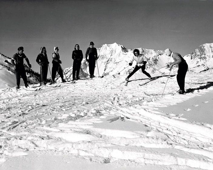 vintage photo of a ski class hosted by a ski school instructor